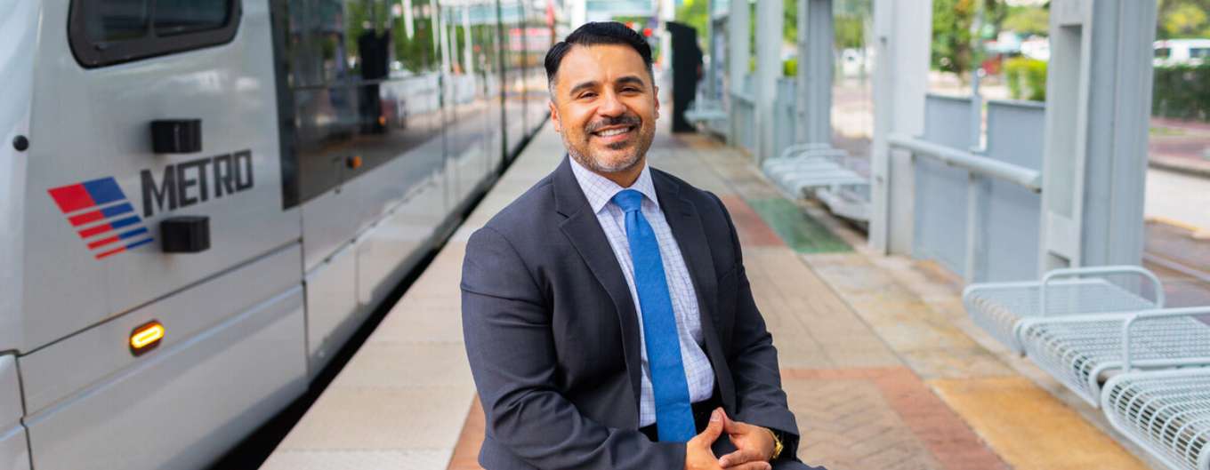 METRO Board Member Angel Ponce waits for the METRORail Red Line.